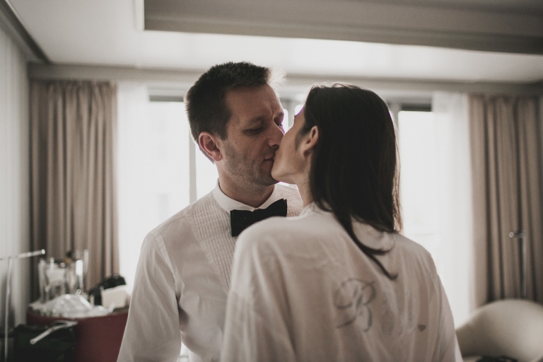 bride and groom kissing each other