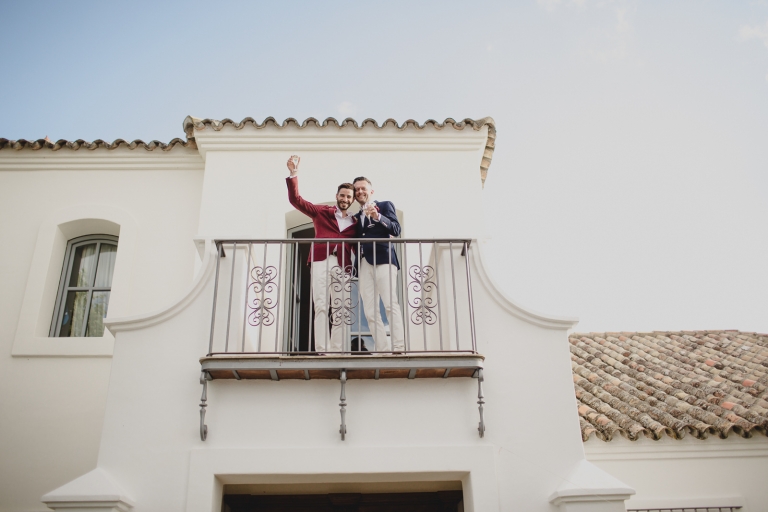 the guests clinking glasses to toast for the couple