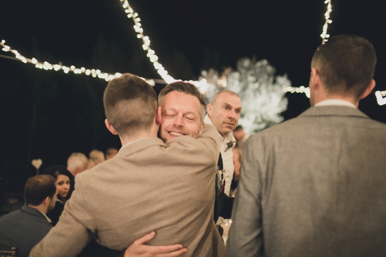 guest of the wedding hugging each other