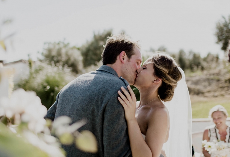 first kiss wedding photo