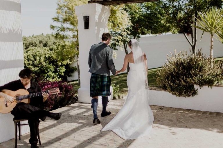 Bride and groom walking down aisle after wedding ceremony