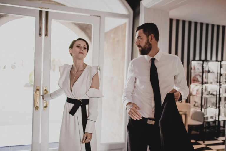 the couple leaving the hotel