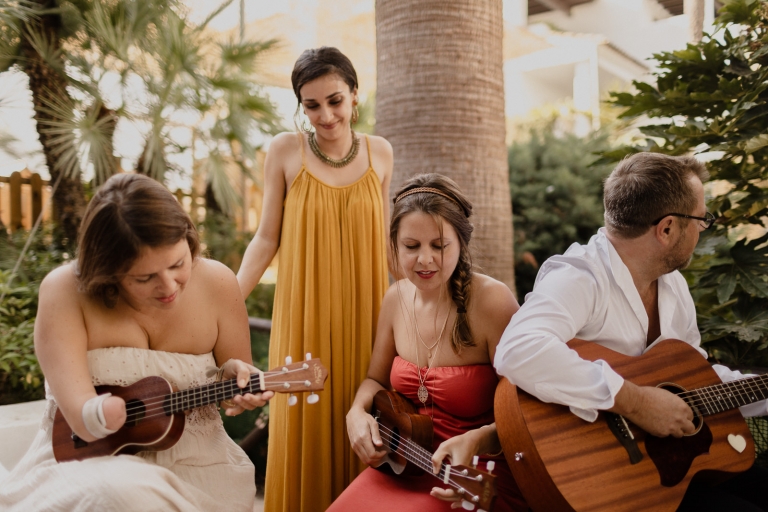 musicians playing the guitar