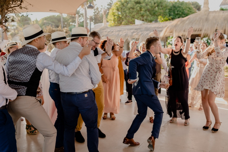 the groom dancing with the guests