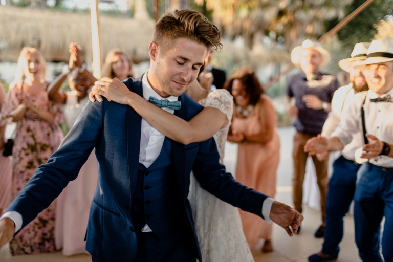 the bride dancing with the guests