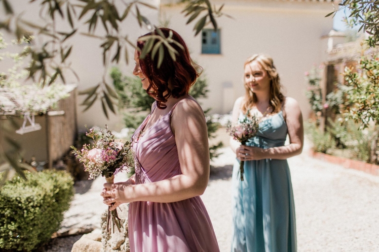 bridesmaids walking down the aisle