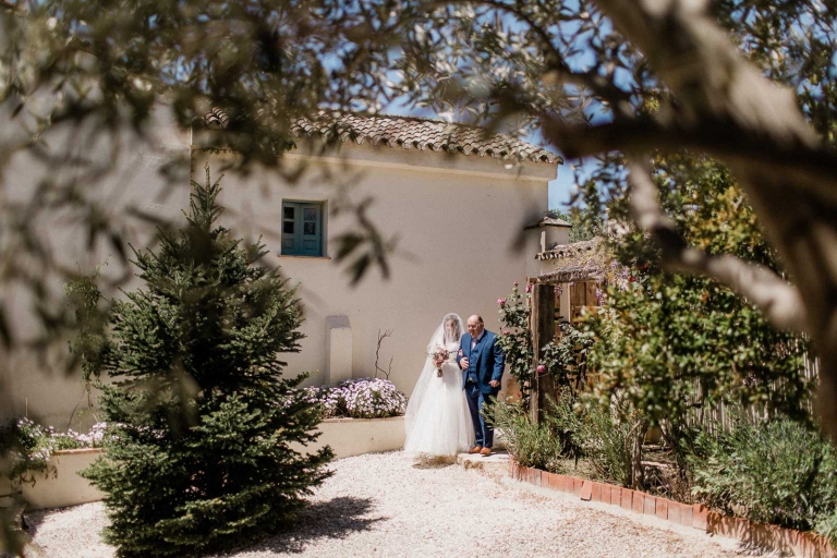 bride and father walking down the aisle